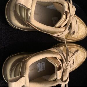 Stylish Puma Gold Women's Sneakers